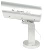 Indoor or outdoor motion activated dummy camera with flashing red LED light.